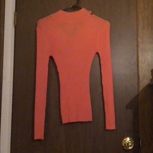 A Peachy Orange Long Sleeve Shirt